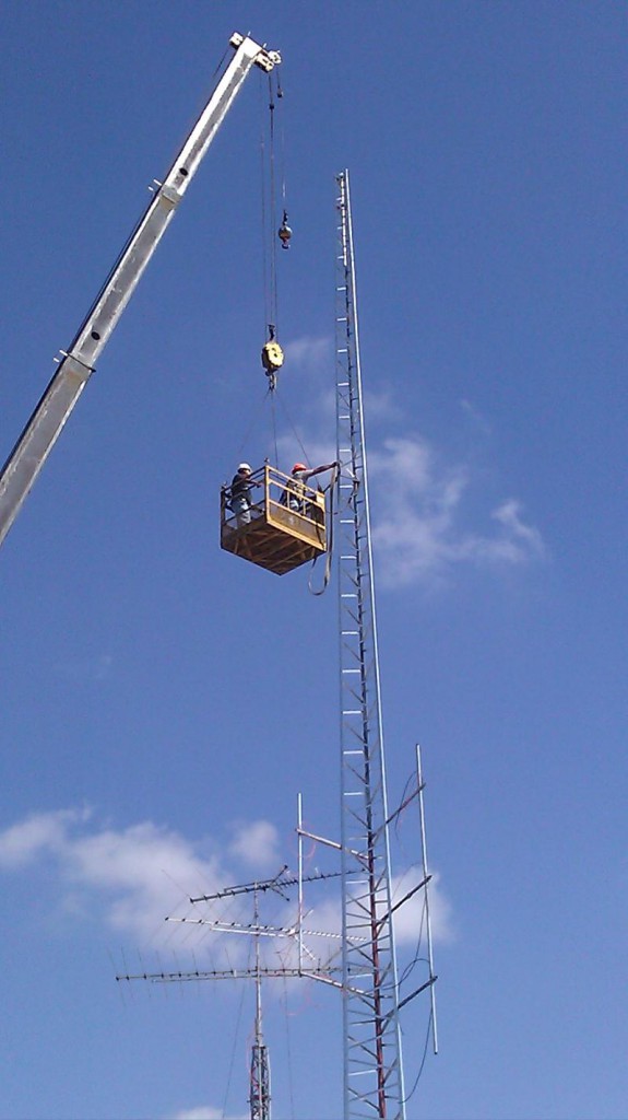 Installing a Wi-Fi tower to bring wireless Internet access to a resort park.