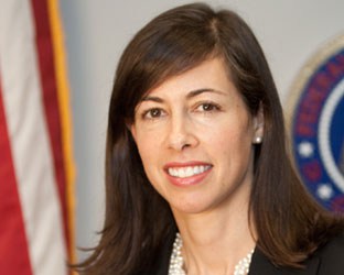 FCC's Rosenworcel met privately with Wall Street analysts to tell them she'll keep an open mind on reviewing a T-Mobile/Sprint merger.