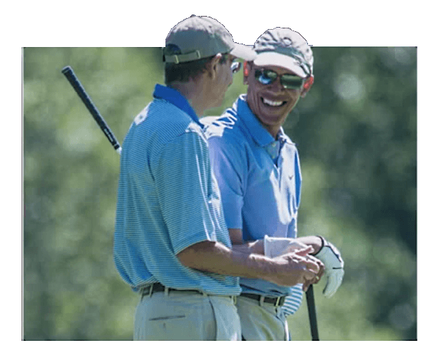 President Barack Obama plays golf with Comcast CEO Brian Roberts.